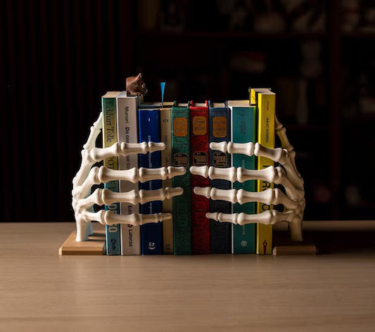 Manitos Blancas, Sujetador de libros.